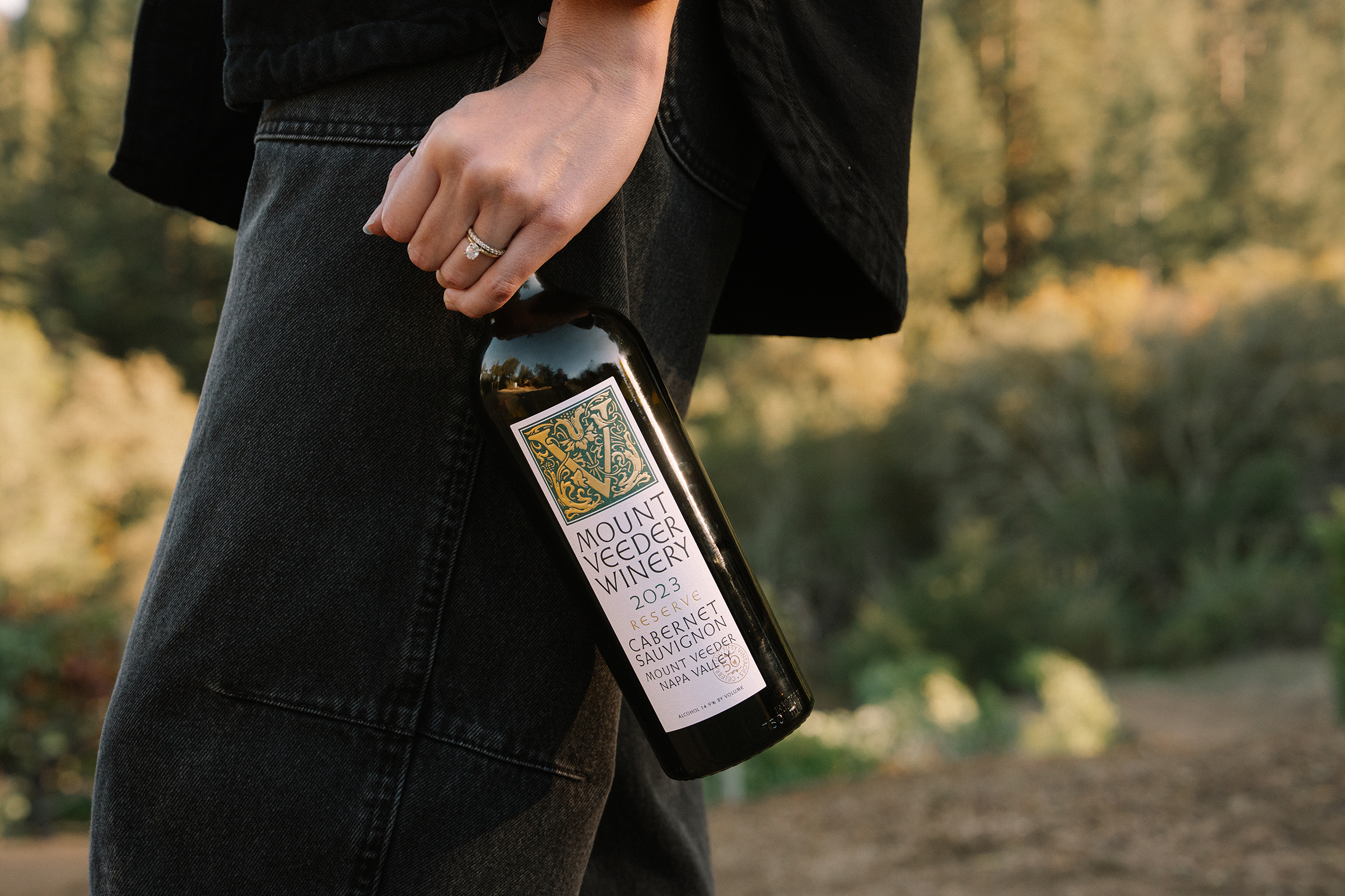 A bottle of 2023 Reserve Cabernet in motion.